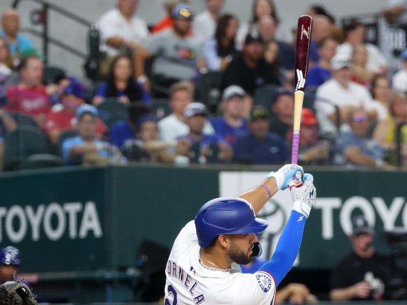 Jul 2, 2024; Arlington, Texas, USA; Texas Rangers third baseman Jonathan Ornelas (21) hits an rbi double during the sixth inning against the San Diego Padres at Globe Life Field. Mandatory Credit: Kevin Jairaj-USA TODAY Sports