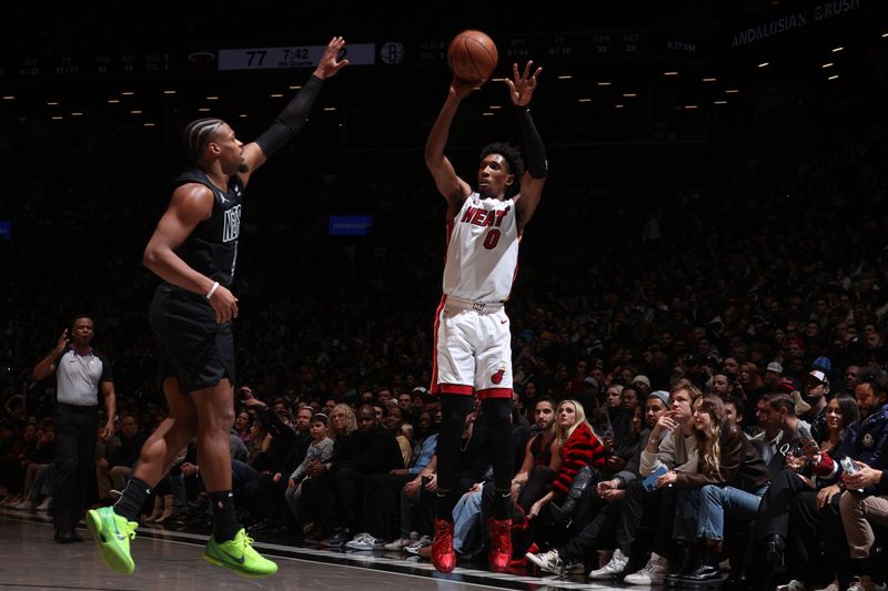 BROOKLYN, NY - JANUARY 15: Josh Richardson #0 of the Miami Heat shoots the ball during the game against the Brooklyn Nets on January 15, 2024 at Barclays Center in Brooklyn, New York. NOTE TO USER: User expressly acknowledges and agrees that, by downloading and or using this Photograph, user is consenting to the terms and conditions of the Getty Images License Agreement. Mandatory Copyright Notice: Copyright 2024 NBAE (Photo by Nathaniel S. Butler/NBAE via Getty Images)