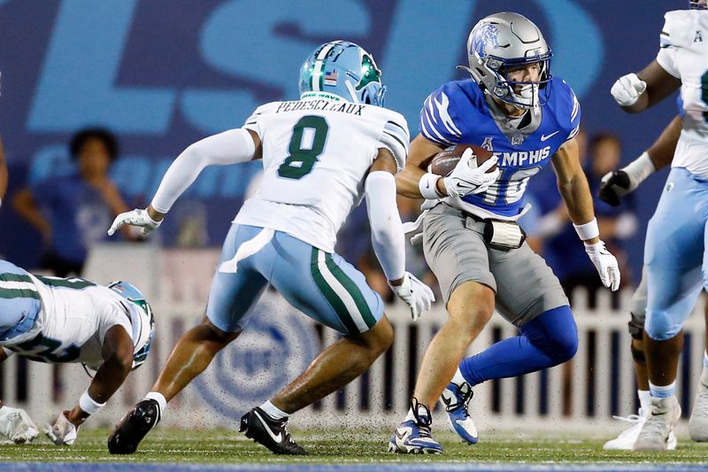 Oct 13, 2023; Memphis, Tennessee, USA; Memphis Tigers wide receiver Koby Drake (10) runs after a catch during the first half against the Tulane Green Wave at Simmons Bank Liberty Stadium. Mandatory Credit: Petre Thomas-USA TODAY Sports