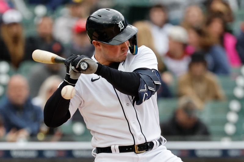 Apr 30, 2023; Detroit, Michigan, USA; Detroit Tigers first baseman Spencer Torkelson (20) is hit by a pitch in the fifth inning against the Baltimore Orioles at Comerica Park. Mandatory Credit: Rick Osentoski-USA TODAY Sports