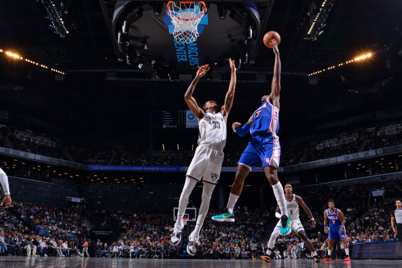 BROOKLYN, NY - MARCH 5: Buddy Heild #17 of the Philadelphia 76ers drives to the basket during the game against the Brooklyn Nets on March 5, 2024 at Barclays Center in Brooklyn, New York. NOTE TO USER: User expressly acknowledges and agrees that, by downloading and or using this Photograph, user is consenting to the terms and conditions of the Getty Images License Agreement. Mandatory Copyright Notice: Copyright 2024 NBAE (Photo by Jesse D. Garrabrant/NBAE via Getty Images)