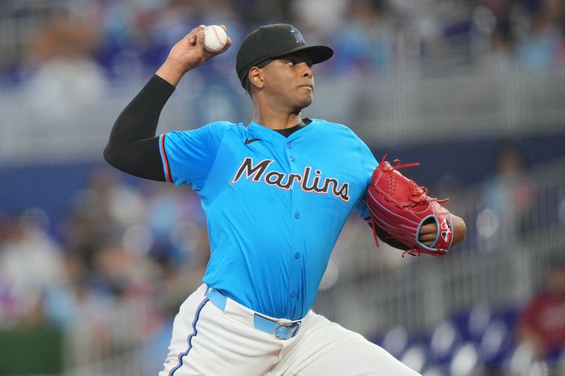 Jul 7, 2024; Miami, Florida, USA;  Miami Marlins starting pitcher Edward Cabrera (27) pitches against the Chicago White Sox at loanDepot Park. Mandatory Credit: Jim Rassol-USA TODAY Sports