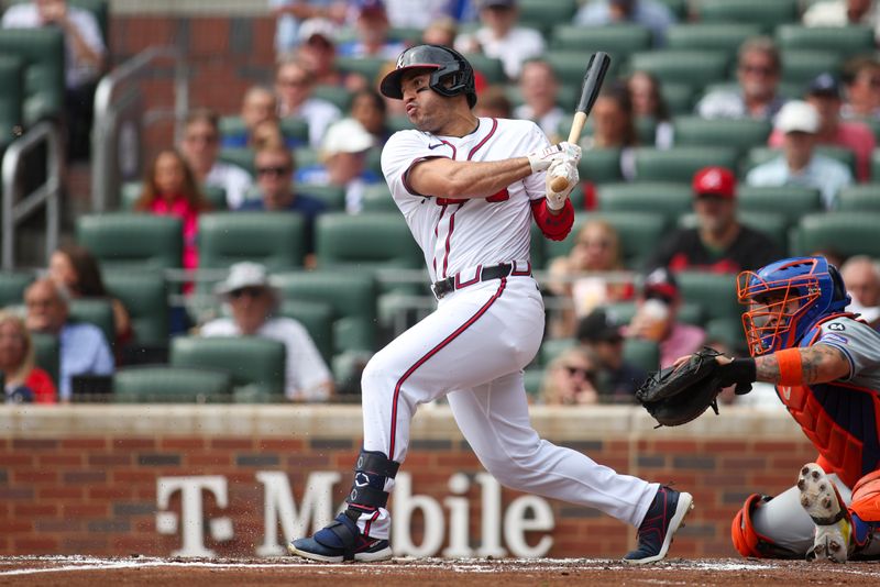 Sep 30, 2024; Atlanta, Georgia, USA; Atlanta Braves left fielder Ramon Laureano (18) hits a single against the New York Mets in the second inning at Truist Park. Mandatory Credit: Brett Davis-Imagn Images
