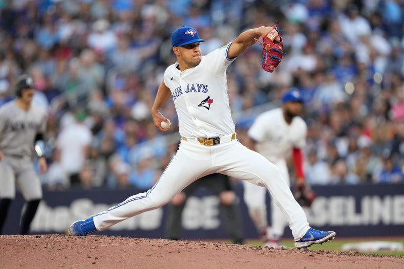 Jun 27, 2024; Toronto, Ontario, CAN; Toronto Blue Jays starting pitcher Jose Berrios (17) pitches to the New York Yankees during the second inning at Rogers Centre. Mandatory Credit: John E. Sokolowski-USA TODAY Sports