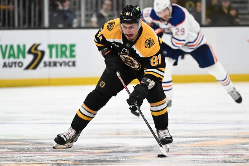 Mar 9, 2023; Boston, Massachusetts, USA; Boston Bruins defenseman Dmitry Orlov (81) skates with the puck against the Edmonton Oilers during the third period at the TD Garden. Mandatory Credit: Brian Fluharty-USA TODAY Sports