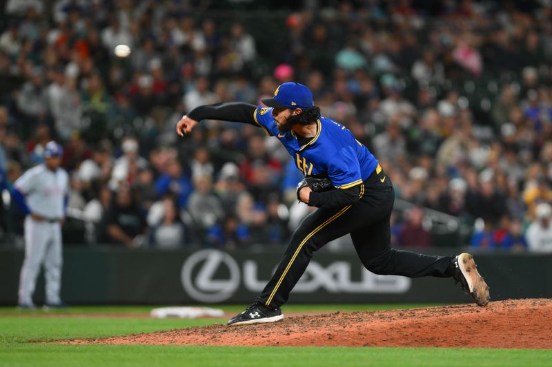 Sep 14, 2024; Seattle, Washington, USA; Seattle Mariners relief pitcher Andres Munoz (75) pitches to the Texas Rangers during the ninth inning at T-Mobile Park. Mandatory Credit: Steven Bisig-Imagn Images