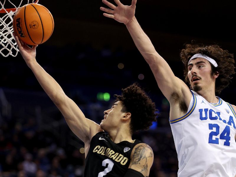 Jan 14, 2023; Los Angeles, California, USA;  Colorado Buffaloes guard KJ Simpson (2) goes to the basket against UCLA Bruins guard Jaime Jaquez Jr. (24) during the first half at Pauley Pavilion presented by Wescom. Mandatory Credit: Kiyoshi Mio-USA TODAY Sports