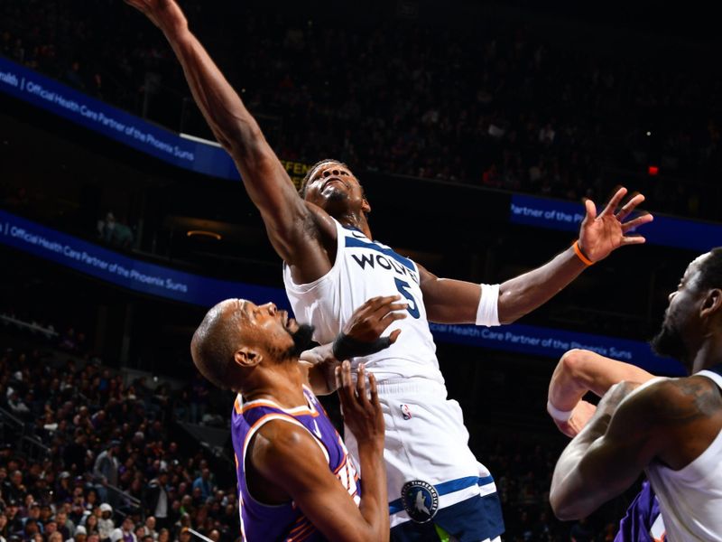 PHOENIX, AZ - JANUARY 29: Anthony Edwards #5 of the Minnesota Timberwolves drives to the basket during the game against the Phoenix Suns on January 29, 2025 at Footprint Center in Phoenix, Arizona. NOTE TO USER: User expressly acknowledges and agrees that, by downloading and or using this photograph, user is consenting to the terms and conditions of the Getty Images License Agreement. Mandatory Copyright Notice: Copyright 2025 NBAE (Photo by Barry Gossage/NBAE via Getty Images)