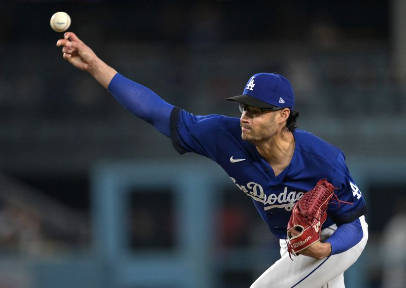 Sep 18, 2023; Los Angeles, California, USA;  Los Angeles Dodgers relief pitcher Joe Kelly (17) delivers a scoreless ninth inning against the Detroit Tigers at Dodger Stadium. Mandatory Credit: Jayne Kamin-Oncea-USA TODAY Sports