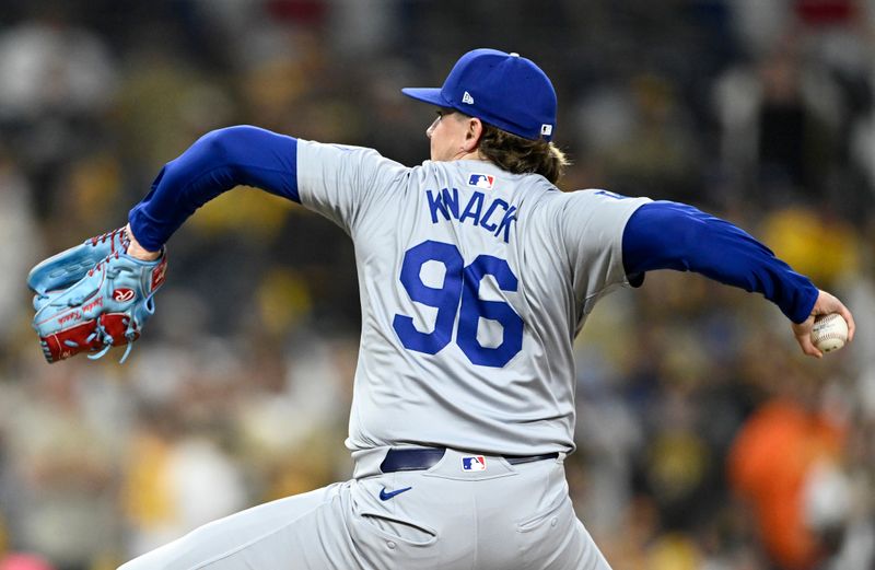 Oct 9, 2024; San Diego, California, USA; Los Angeles Dodgers pitcher Landon Knack (96) throws in the ninth inning against the San Diego Padres during game four of the NLDS for the 2024 MLB Playoffs at Petco Park.  Mandatory Credit: Denis Poroy-Imagn Images
