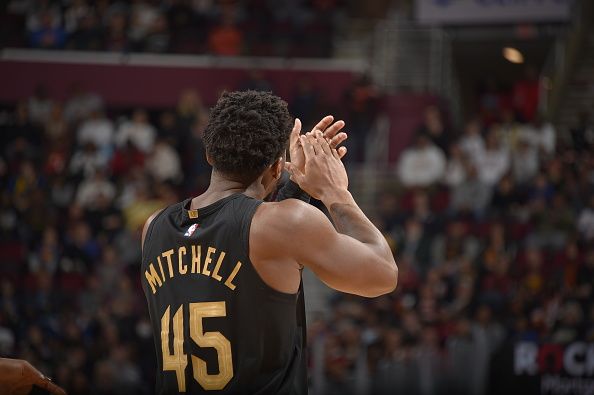 CLEVELAND, OH - NOVEMBER 5: Donovan Mitchell #45 of the Cleveland Cavaliers encourages the crowd during the game against the Golden State Warriors on November 5, 2023 at Rocket Mortgage FieldHouse in Cleveland, Ohio. NOTE TO USER: User expressly acknowledges and agrees that, by downloading and/or using this Photograph, user is consenting to the terms and conditions of the Getty Images License Agreement. Mandatory Copyright Notice: Copyright 2023 NBAE (Photo by David Liam Kyle/NBAE via Getty Images)