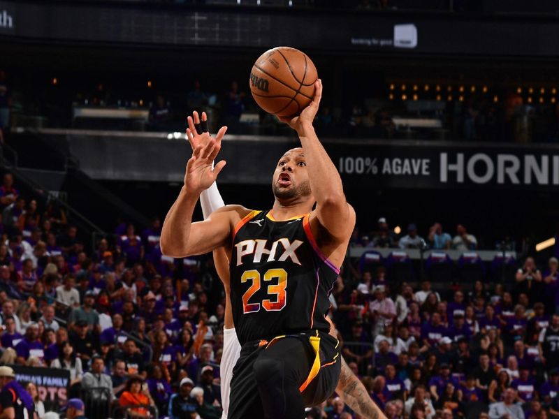 PHOENIX, AZ - APRIL  26: Eric Gordon #23 of the Phoenix Suns drives to the basket during the game against the Minnesota Timberwolves on April 26, 2024 at Footprint Center in Phoenix, Arizona. NOTE TO USER: User expressly acknowledges and agrees that, by downloading and or using this photograph, user is consenting to the terms and conditions of the Getty Images License Agreement. Mandatory Copyright Notice: Copyright 2024 NBAE (Photo by Kate Frese/NBAE via Getty Images)