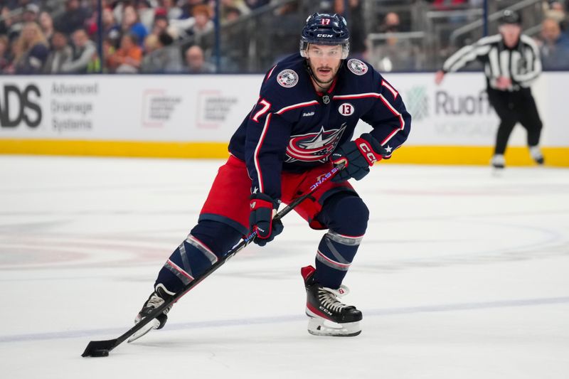 Oct 22, 2024; Columbus, Ohio, USA; Columbus Blue Jackets right wing Justin Danforth (17) skates with the puck against the Toronto Maple Leafs during the second period at Nationwide Arena. Mandatory Credit: Aaron Doster-Imagn Images