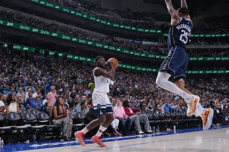 DALLAS, TX - MAY 28: Anthony Edwards #5 of the Minnesota Timberwolves handles the ball during the game against the Dallas Mavericks during Game 3 of the Western Conference Finals of the 2024 NBA Playoffs on May 28, 2024 at the American Airlines Center in Dallas, Texas. NOTE TO USER: User expressly acknowledges and agrees that, by downloading and or using this photograph, User is consenting to the terms and conditions of the Getty Images License Agreement. Mandatory Copyright Notice: Copyright 2024 NBAE (Photo by Jesse D. Garrabrant/NBAE via Getty Images)