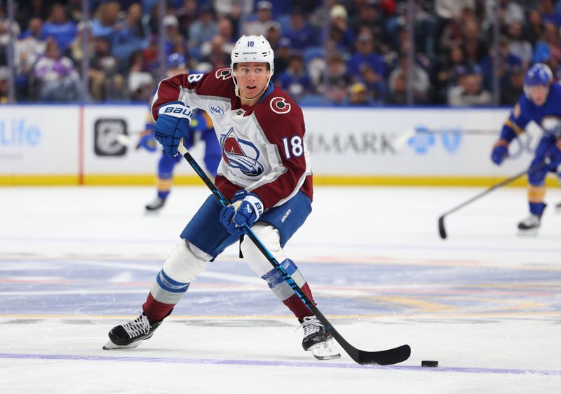 Oct 13, 2025; Buffalo, New York, USA;  Colorado Avalanche center Jack Drury (18) looks to make a pass during the first period against the Buffalo Sabres at KeyBank Center. Mandatory Credit: Timothy T. Ludwig-Imagn Images