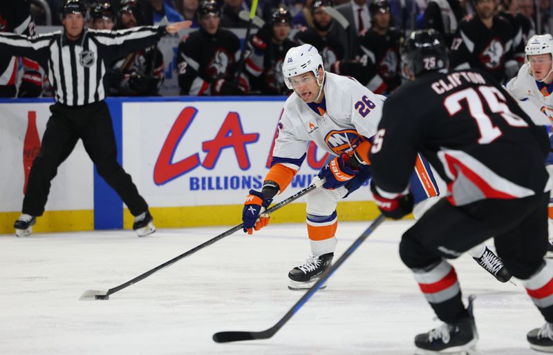 Nov 1, 2024; Buffalo, New York, USA;  New York Islanders right wing Oliver Wahlstrom (26) looks to take a shot on goal during the first period against the Buffalo Sabres at KeyBank Center. Mandatory Credit: Timothy T. Ludwig-Imagn Images