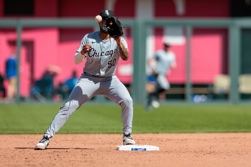 Apr 7, 2024; Kansas City, Missouri, USA; Chicago White Sox second base Lenyn Sosa (50) reaches for a throw at 2nd base during the eighth inning against the Kansas City Royals at Kauffman Stadium. Mandatory Credit: William Purnell-USA TODAY Sports