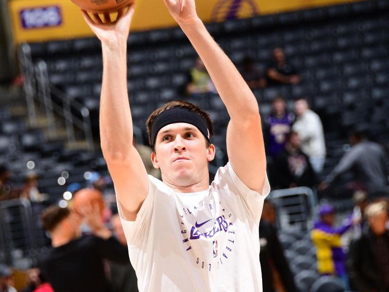 LOS ANGELES, CA - JANUARY 2: Austin Reaves #15 of the Los Angeles Lakers warms up before the game against the Portland Trail Blazers on January 2, 2025 at Crypto.Com Arena in Los Angeles, California. NOTE TO USER: User expressly acknowledges and agrees that, by downloading and/or using this Photograph, user is consenting to the terms and conditions of the Getty Images License Agreement. Mandatory Copyright Notice: Copyright 2025 NBAE (Photo by Adam Pantozzi/NBAE via Getty Images)