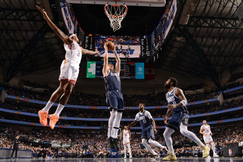 DALLAS, TX - NOVEMBER 8: Luka Doncic #77 of the Dallas Mavericks drives to the basket during the game against the Phoenix Suns on November 6, 2024 at the American Airlines Center in Dallas, Texas. NOTE TO USER: User expressly acknowledges and agrees that, by downloading and or using this photograph, User is consenting to the terms and conditions of the Getty Images License Agreement. Mandatory Copyright Notice: Copyright 2024 NBAE (Photo by Glenn James/NBAE via Getty Images)