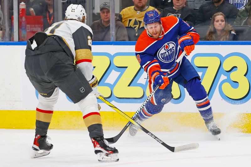 Apr 10, 2024; Edmonton, Alberta, CAN; Edmonton Oilers forward Connor Brown (28) takes a shot in front of Vegas Golden Knights forward Brett Howden (21) during the first period at Rogers Place. Mandatory Credit: Perry Nelson-USA TODAY Sports