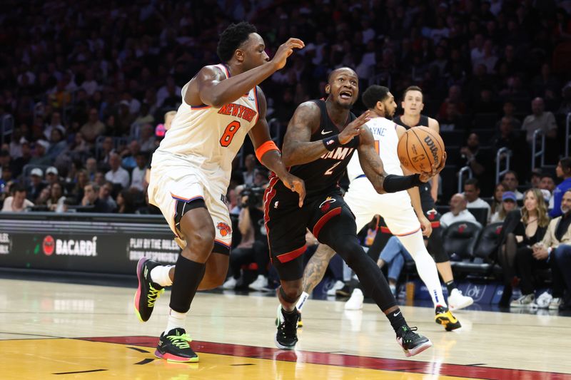 MIAMI, FLORIDA - MARCH 02: Terry Rozier #2 of the Miami Heat drives against OG Anunoby #8 of the New York Knicks during the third quarter of the game at Kaseya Center on March 02, 2025 in Miami, Florida. NOTE TO USER: User expressly acknowledges and agrees that, by downloading and or using this photograph, User is consenting to the terms and conditions of the Getty Images License Agreement. (Photo by Megan Briggs/Getty Images)