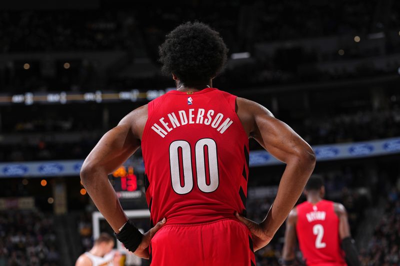 DENVER, CO - FEBRUARY 4: Scoot Henderson #00 of the Portland Trail Blazers looks on during the game against the Denver Nuggets on February 4, 2024 at the Ball Arena in Denver, Colorado. NOTE TO USER: User expressly acknowledges and agrees that, by downloading and/or using this Photograph, user is consenting to the terms and conditions of the Getty Images License Agreement. Mandatory Copyright Notice: Copyright 2024 NBAE (Photo by Bart Young/NBAE via Getty Images)