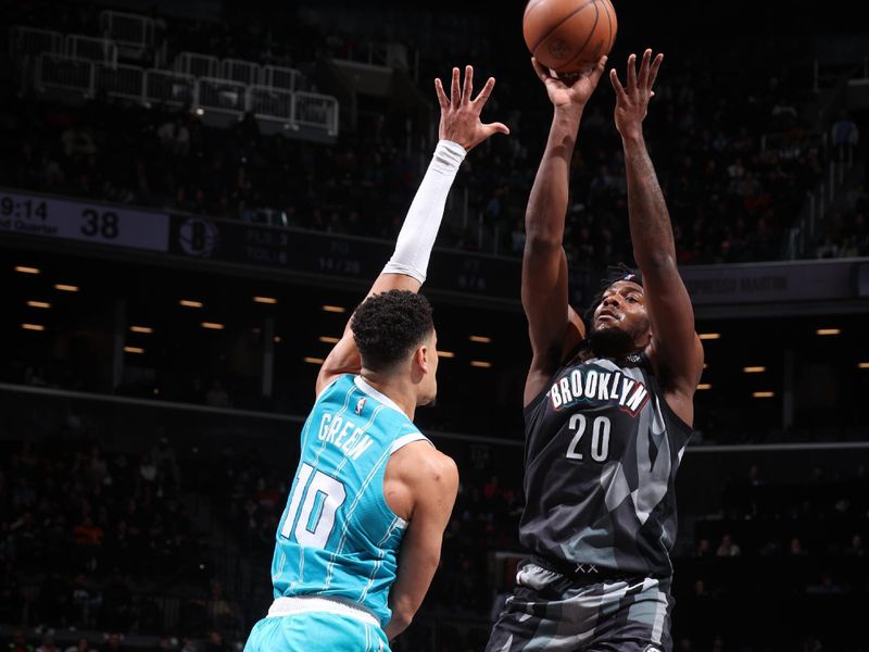 BROOKLYN, NY - FEBRUARY 10: Day'Ron Sharpe #20 of the Brooklyn Nets shoots a three point basket during the game against the Charlotte Hornets on February 10, 2025 at Barclays Center in Brooklyn, New York. NOTE TO USER: User expressly acknowledges and agrees that, by downloading and or using this Photograph, user is consenting to the terms and conditions of the Getty Images License Agreement. Mandatory Copyright Notice: Copyright 2025 NBAE (Photo by Nathaniel S. Butler/NBAE via Getty Images)