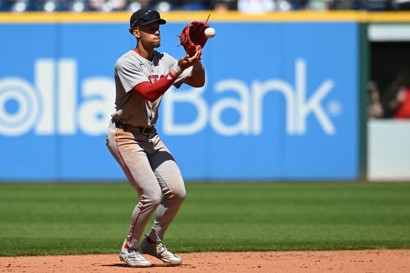 Apr 27, 2025; Cleveland, Ohio, USA; Boston Red Sox second baseman Kristian Campbell (28) fields a ball hit by Cleveland Guardians third baseman Will Wilson (not pictured) during the fifth inning at Progressive Field. Mandatory Credit: Ken Blaze-Imagn Images