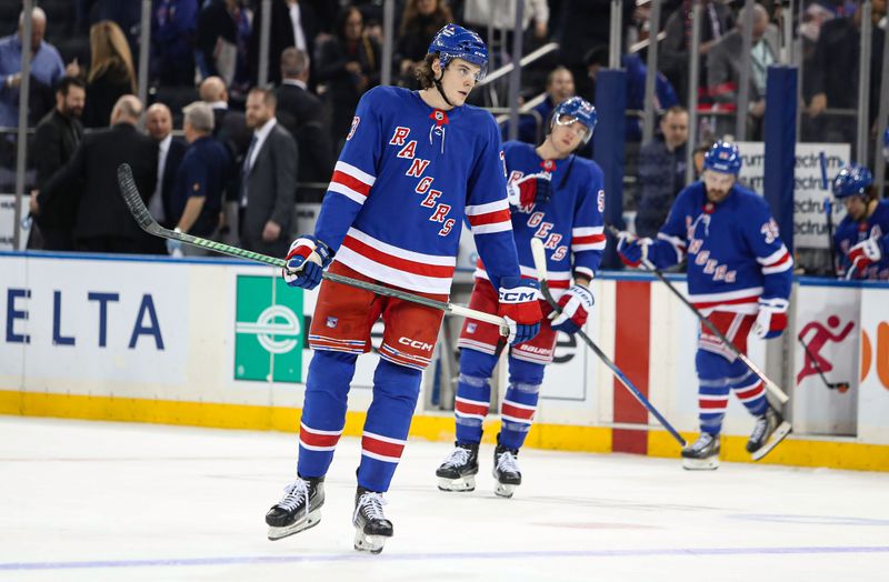 Nov 25, 2024; New York, New York, USA; New York Rangers center Matt Rempe (73) skates off the ice after a 5-2 loss against the St. Louis Blues at Madison Square Garden. Mandatory Credit: Danny Wild-Imagn Images