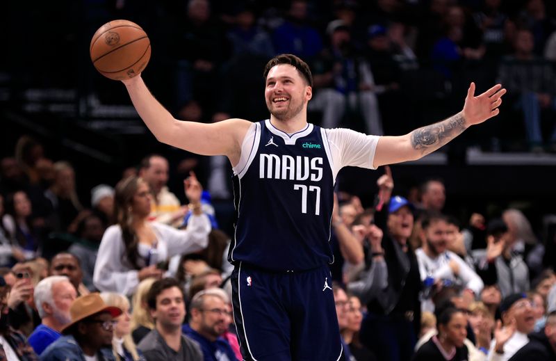 DALLAS, TX - JANUARY 27: Luka Doncic #77 of the Dallas Mavericks reacts late in the second half as Dallas takes on the Sacramento Kings at American Airlines Center on January 27, 2024 in Dallas, Texas. NOTE TO USER: User expressly acknowledges and agrees that, by downloading and or using this photograph, User is consenting to the terms and conditions of the Getty Images License Agreement. (Photo by Ron Jenkins/Getty Images)