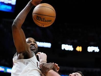 MIAMI, FLORIDA - DECEMBER 08: Kevin Love #42 of the Miami Heat fouls Tristan Thompson #12 of the Cleveland Cavaliers during the second quarter at Kaseya Center on December 08, 2023 in Miami, Florida. NOTE TO USER: User expressly acknowledges and agrees that, by downloading and or using this photograph, User is consenting to the terms and condtions of the Getty Images License Agreement.  (Photo by Rich Storry/Getty Images)