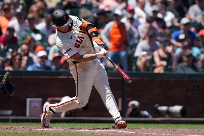 Jun 2, 2024; San Francisco, California, USA; San Francisco Giants shortstop Casey Schmitt (10) hits a home run against the New York Yankees during the fourth inning at Oracle Park. Mandatory Credit: Darren Yamashita-USA TODAY Sports