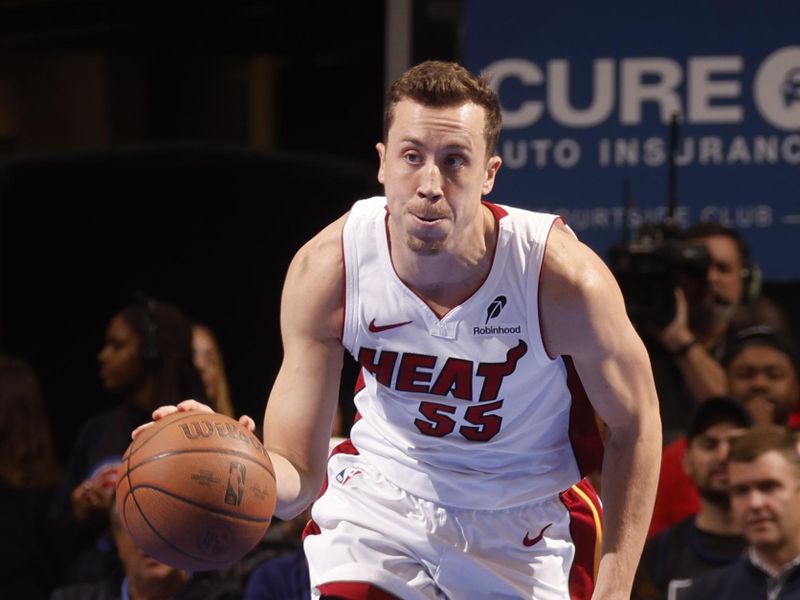 DETROIT, MI - NOOVEMBER 12:  Duncan Robinson #55 of the Miami Heat dribbles the ball during the game against the Detroit Pistons during the Emirates NBA Cup game on November 12, 2024 at Little Caesars Arena in Detroit, Michigan. NOTE TO USER: User expressly acknowledges and agrees that, by downloading and/or using this photograph, User is consenting to the terms and conditions of the Getty Images License Agreement. Mandatory Copyright Notice: Copyright 2024 NBAE (Photo by Brian Sevald/NBAE via Getty Images)