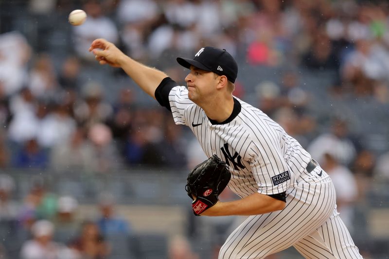 Aug 24, 2023; Bronx, New York, USA; New York Yankees starting pitcher Michael King (34) pitches against the Washington Nationals during the first inning at Yankee Stadium. Mandatory Credit: Brad Penner-USA TODAY Sports