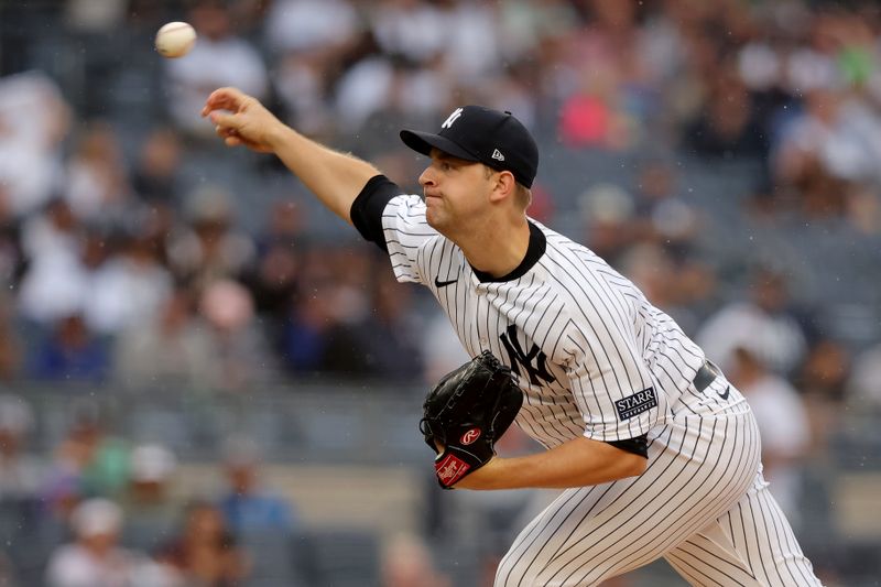 Aug 24, 2023; Bronx, New York, USA; New York Yankees starting pitcher Michael King (34) pitches against the Washington Nationals during the first inning at Yankee Stadium. Mandatory Credit: Brad Penner-USA TODAY Sports