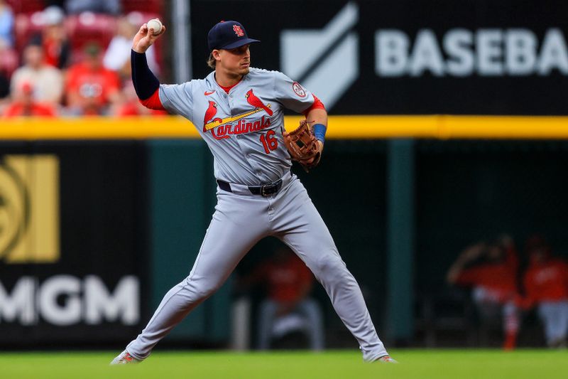 May 29, 2024; Cincinnati, Ohio, USA; St. Louis Cardinals second baseman Nolan Gorman (16) throws to first to get Cincinnati Reds outfielder Will Benson (not pictured) out in the third inning at Great American Ball Park. Mandatory Credit: Katie Stratman-USA TODAY Sports