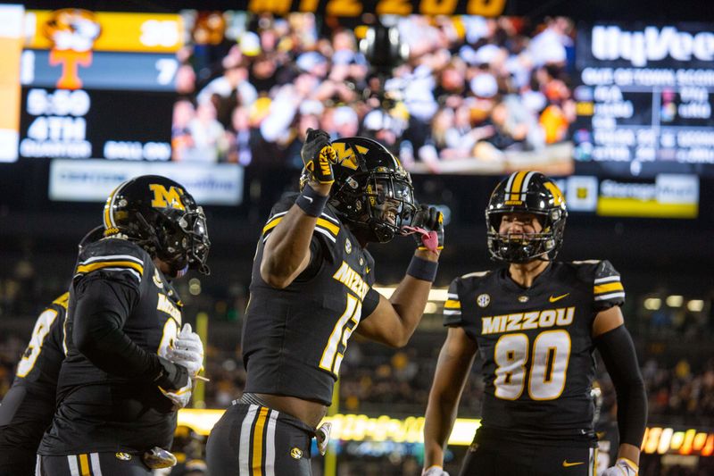 Nov 11, 2023; Columbia, Missouri, USA; Missouri Tigers defensive back Daylan Carnell (13) celebrates after returning an interception for a touchdown in the fourth quarter at Faurot Field at Memorial Stadium. Mandatory Credit: Kylie Graham-USA TODAY Sports