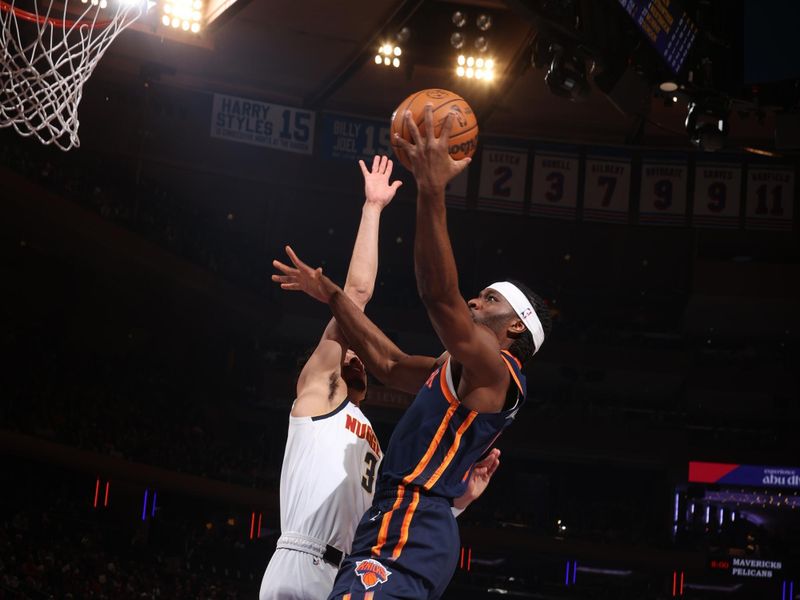 NEW YORK, NY - JANUARY 29:  Precious Achiuwa #5 of the New York Knicks drives to the basket during the game against the Denver Nuggets on January 29, 2025 at Madison Square Garden in New York City, New York.  NOTE TO USER: User expressly acknowledges and agrees that, by downloading and or using this photograph, User is consenting to the terms and conditions of the Getty Images License Agreement. Mandatory Copyright Notice: Copyright 2025 NBAE  (Photo by Nathaniel S. Butler/NBAE via Getty Images)