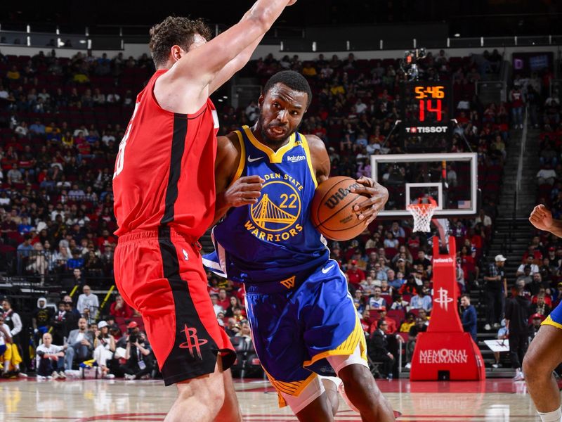 HOUSTON, TX - NOVEMBER 2:  Andrew Wiggins #22 of the Golden State Warriors drives to the basket during the game against the Houston Rockets on October 22, 2024 at the Toyota Center in Houston, Texas. NOTE TO USER: User expressly acknowledges and agrees that, by downloading and or using this photograph, User is consenting to the terms and conditions of the Getty Images License Agreement. Mandatory Copyright Notice: Copyright 2024 NBAE (Photo by Logan Riely/NBAE via Getty Images)