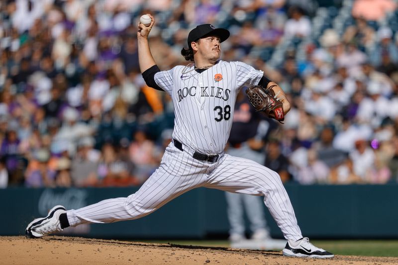 May 27, 2024; Denver, Colorado, USA; Colorado Rockies relief pitcher Victor Vodnik (38) pitches in the eighth inning against the Cleveland Guardians at Coors Field. Mandatory Credit: Isaiah J. Downing-USA TODAY Sports