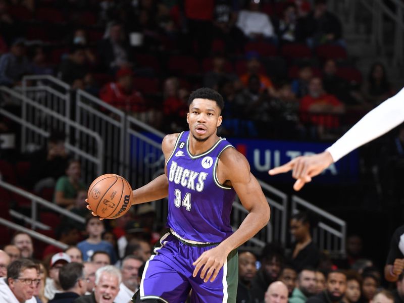 HOUSTON, TX - DECEMBER 11:  Giannis Antetokounmpo #34 of the Milwaukee Bucks dribbles the ball during the game against the Houston Rockets on December 11, 2022 at the Toyota Center in Houston, Texas. NOTE TO USER: User expressly acknowledges and agrees that, by downloading and or using this photograph, User is consenting to the terms and conditions of the Getty Images License Agreement. Mandatory Copyright Notice: Copyright 2022 NBAE (Photo by Logan Riely/NBAE via Getty Images)