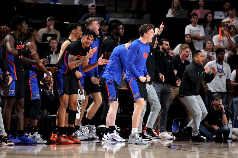 Jan 18, 2023; College Station, Texas, USA; The Florida Gators bench cheers after a made basket against the Texas A&M Aggies during the second half at Reed Arena. Mandatory Credit: Erik Williams-USA TODAY Sports
