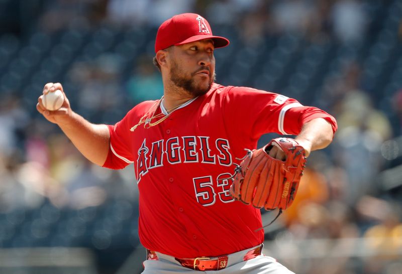 May 8, 2024; Pittsburgh, Pennsylvania, USA;  Los Angeles Angels relief pitcher Carlos Estévez (53) pitches against the Pittsburgh Pirates during the ninth inning at PNC Park. Mandatory Credit: Charles LeClaire-USA TODAY Sports