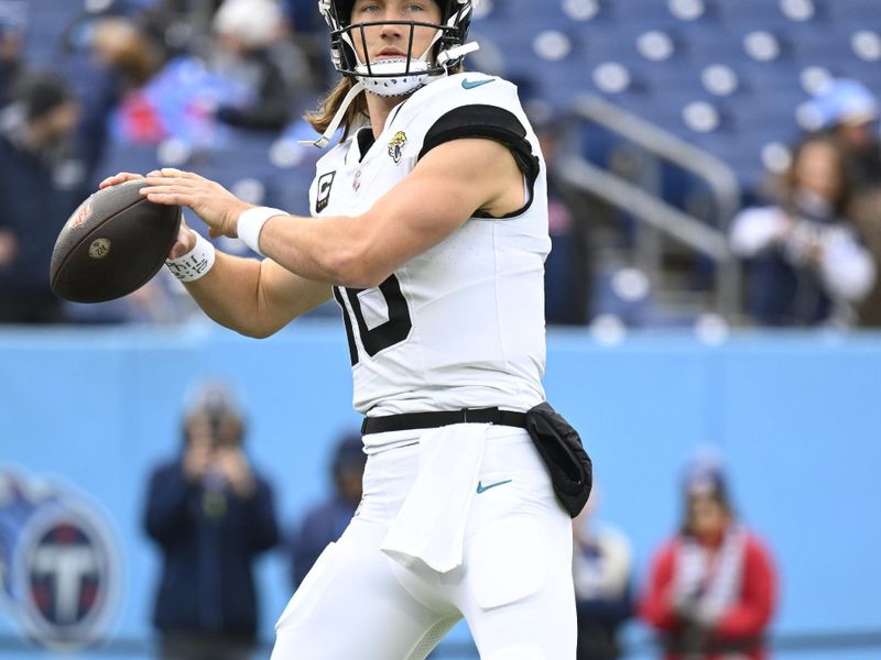 Jacksonville Jaguars quarterback Trevor Lawrence (16) warms up before an NFL football game against the Tennessee Titans Sunday, Jan. 7, 2024, in Nashville, Tenn. (AP Photo/John Amis)