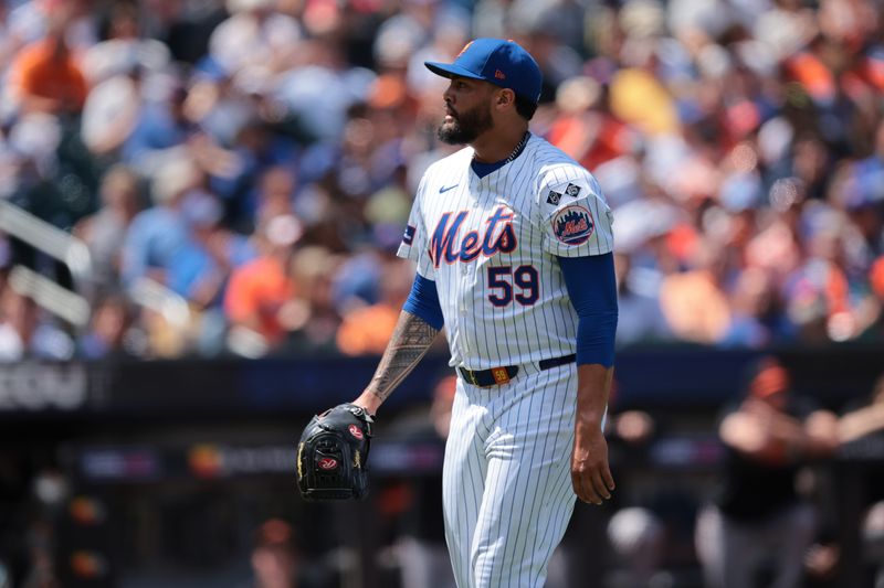 Aug 21, 2024; New York City, New York, USA; New York Mets starting pitcher Sean Manaea (59) walks off the field after the top of the fourth inning against the Baltimore Orioles at Citi Field. Mandatory Credit: Vincent Carchietta-USA TODAY Sports