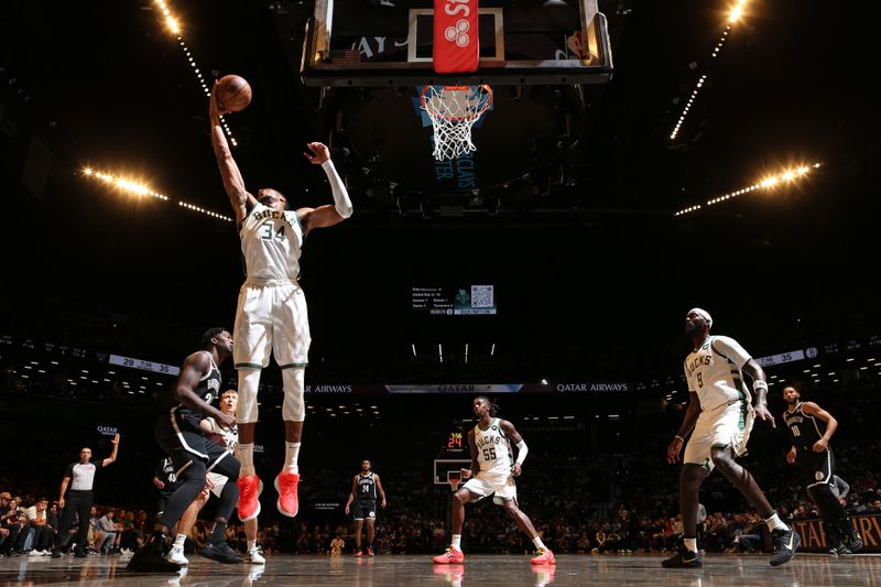 BROOKLYN, NY - OCTOBER 27: Giannis Antetokounmpo #34 of the Milwaukee Bucks goes up for the rebound during the game against the Brooklyn Nets on October 27, 2024 at Barclays Center in Brooklyn, New York. NOTE TO USER: User expressly acknowledges and agrees that, by downloading and or using this Photograph, user is consenting to the terms and conditions of the Getty Images License Agreement. Mandatory Copyright Notice: Copyright 2024 NBAE (Photo by Nathaniel S. Butler/NBAE via Getty Images)