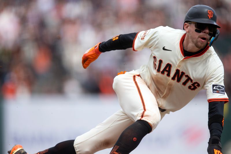 Apr 26, 2025; San Francisco, California, USA; San Francisco Giants second baseman Christian Koss (50) rounds second and heads for third on a double by Sam Huff against the Texas Rangers during the fifth inning at Oracle Park. Mandatory Credit: D. Ross Cameron-Imagn Images