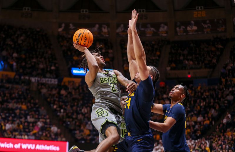 Feb 17, 2024; Morgantown, West Virginia, USA; Baylor Bears guard Jayden Nunn (2) shoots against West Virginia Mountaineers forward Patrick Suemnick (24) during the first half at WVU Coliseum. Mandatory Credit: Ben Queen-USA TODAY Sports