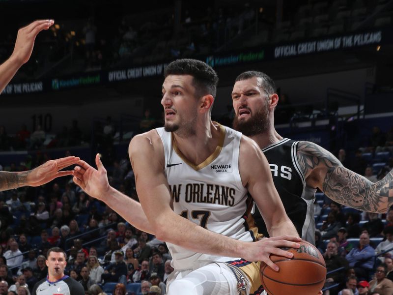 NEW ORLEANS, LA - FEBRUARY 25: Karlo Matkovic #17 of the New Orleans Pelicans passes the ball during the game against the San Antonio Spurs on February 25, 2025 at the Smoothie King Center in New Orleans, Louisiana. NOTE TO USER: User expressly acknowledges and agrees that, by downloading and or using this Photograph, user is consenting to the terms and conditions of the Getty Images License Agreement. Mandatory Copyright Notice: Copyright 2025 NBAE (Photo by Layne Murdoch Jr./NBAE via Getty Images)