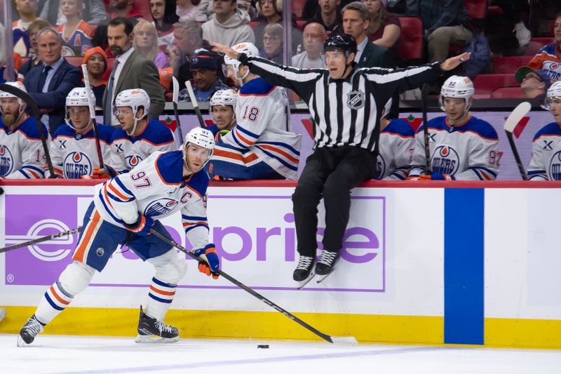 Nov 19, 2024; Ottawa, Ontario, CAN; Edmonton Oilers center Connor McDavid (97) skates with the puck in the second period against the Ottawa Senators at the Canadian Tire Centre. Mandatory Credit: Marc DesRosiers-Imagn Images